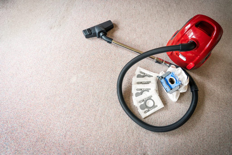 Not replacing the bag or emptying the canister