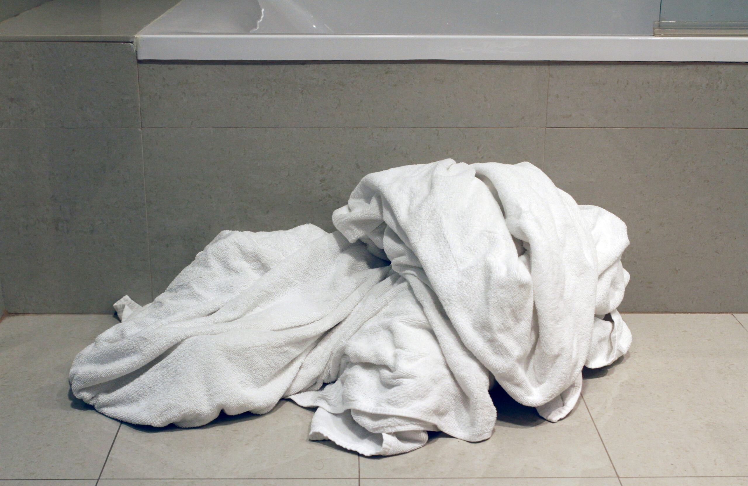 Leave the used towels in the tub