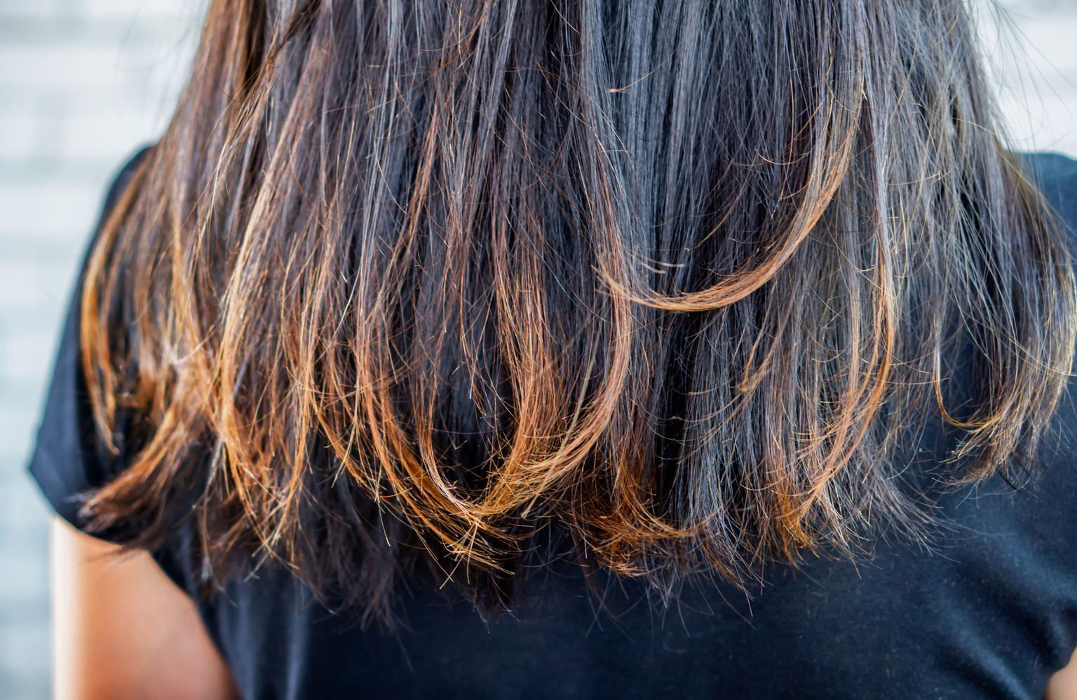 The stylist’s hair looks worse for wear
