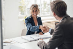 shaking hands at an interview