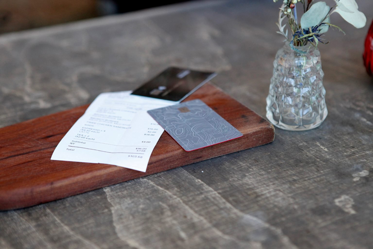 Insisting on paying the bill at a restaurant